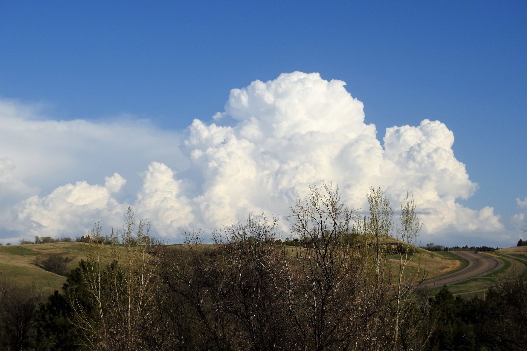 Accumulating Cumulus Clouds Above University of Mary Hill